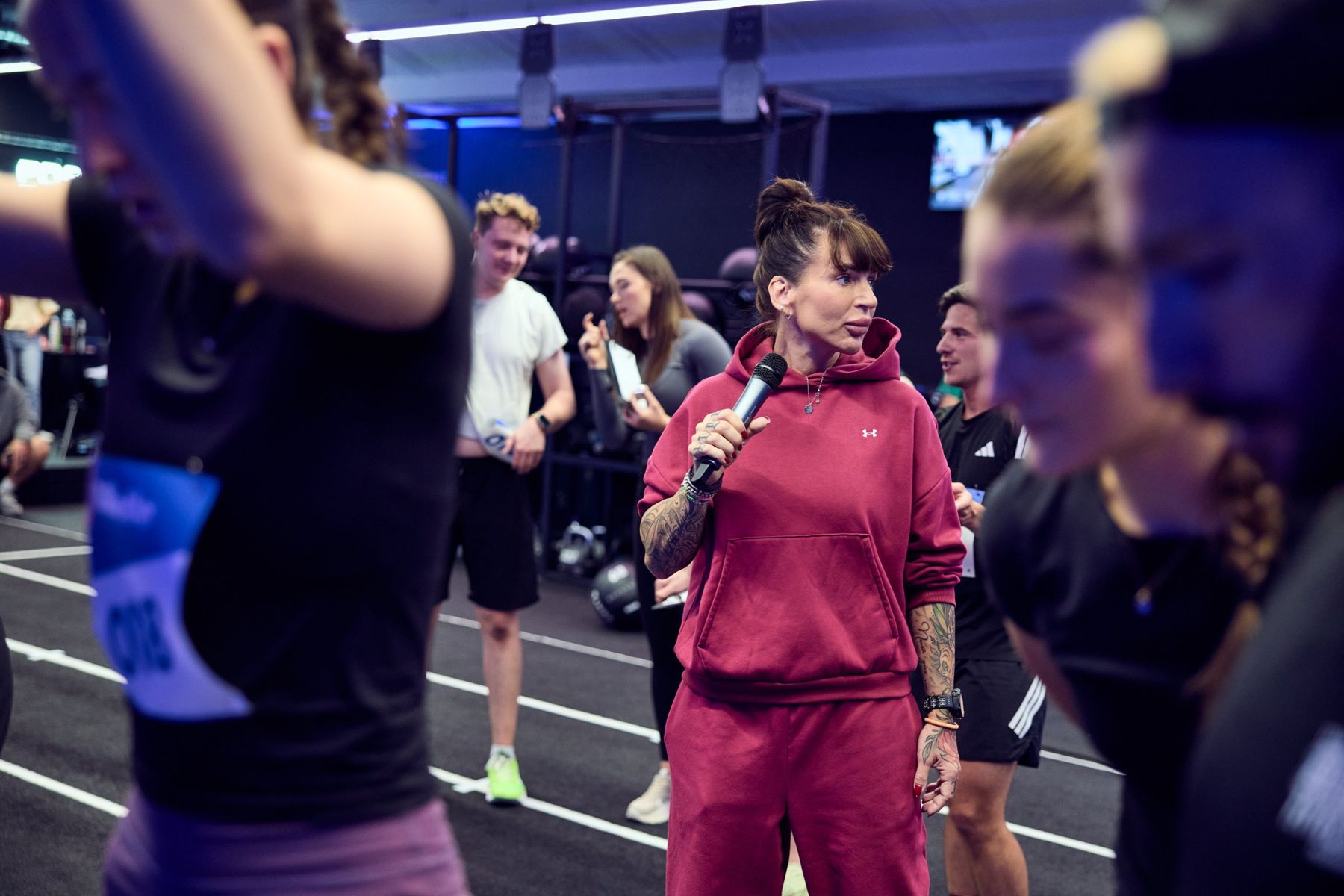 Ria coaching a group of athletes
